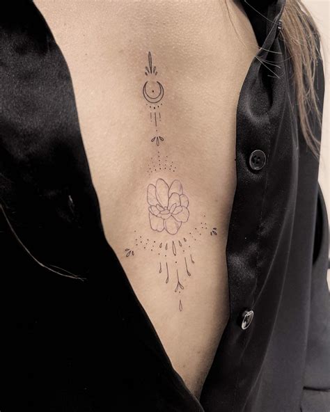 middle boob tattoo|80 Mid Breast Tattoo ideas 